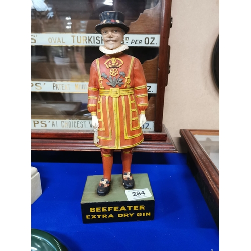 284 - Beefeater London Gin rubberoid advertising figure. {37 cm H x 14 cm W x 9 cm D}.