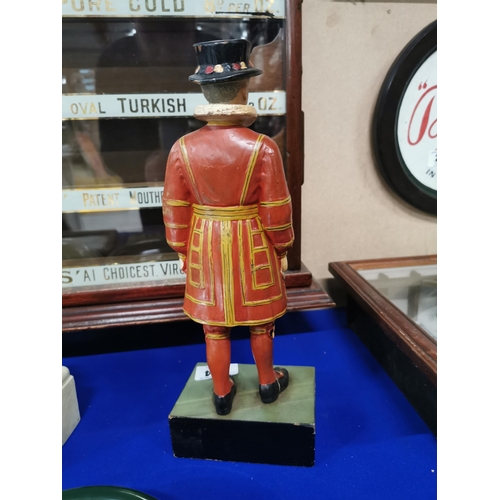 284 - Beefeater London Gin rubberoid advertising figure. {37 cm H x 14 cm W x 9 cm D}.