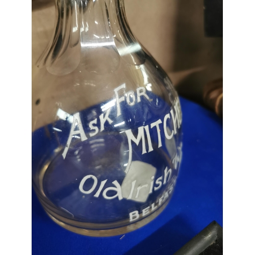 292 - Mitchell�s Old Irish Whiskey Befast glass advertising carafe. {22 cm H x 13 cm Dia}.