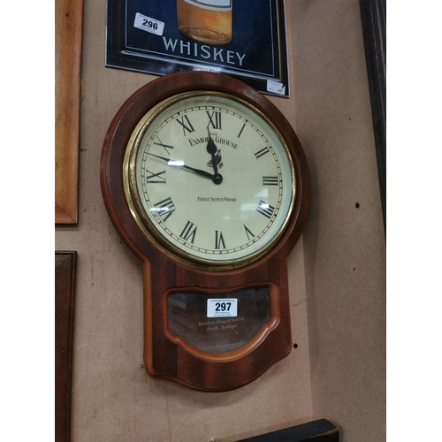 297 - Famous Grouse Finest Whiskey battery operated advertising clock. {47 cm H x 34 cm W}.