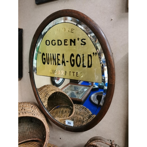 301 - Ogden's Guinea Gold framed advertising mirror. {65 cm H x 50 cm W}.