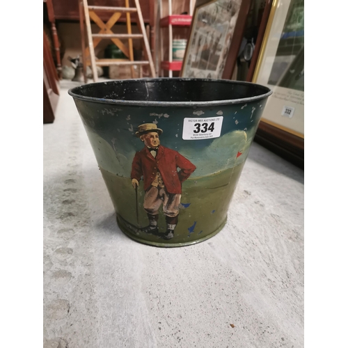 334 - Painted metal waste paper bin depicting Golfer. {22 cm H x 29 cm Dia}