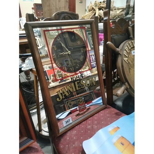 347 - John Jameson Irish Whisky battery operated framed advertising clock.  {50  cm H x 34 cm W}.