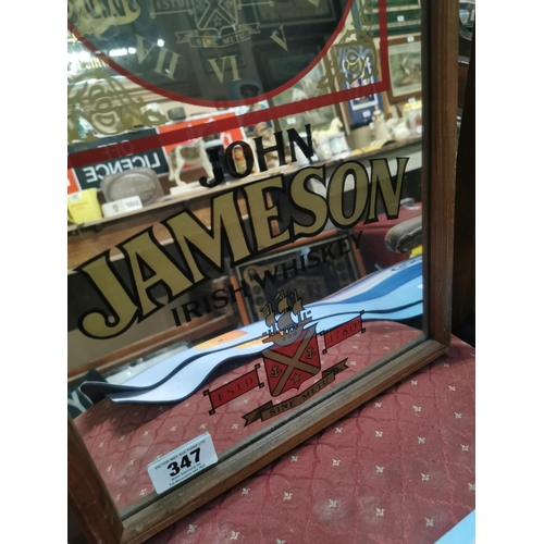 347 - John Jameson Irish Whisky battery operated framed advertising clock.  {50  cm H x 34 cm W}.