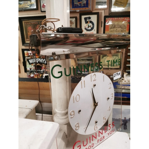 357a - Guinness Is Good For you chrome and perspex electric advertising clock. {41 cm H x 36 cm W}.