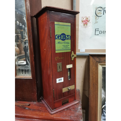 415 - Early 20th C. mahogany Richmond Gem cigarette dispensing machine. {57 cm H x 52 cm W x 22 cm D}.