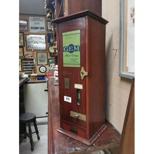 415 - Early 20th C. mahogany Richmond Gem cigarette dispensing machine. {57 cm H x 52 cm W x 22 cm D}.