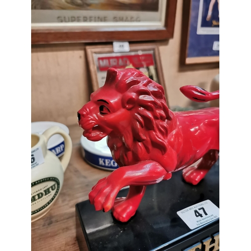 47 - Perspex Booths Gin advertising figure in the form of Lion. {27 cm H x 26 cm W x 10 cm D}.