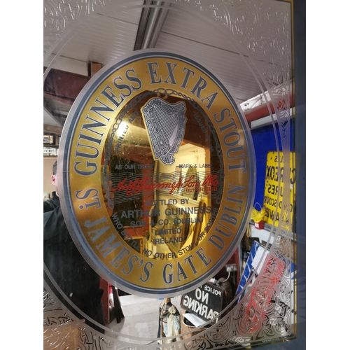 481 - Guinness Extra Stout framed advertising mirror. {126 cm H x 104 cm W}.