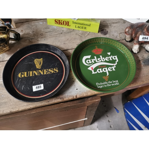 485 - Guinness tin plate advertising drink�s tray and Carlsberg tin plate drink�s tray . {30 cm Dia}.