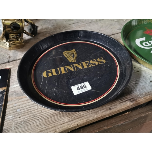 485 - Guinness tin plate advertising drink�s tray and Carlsberg tin plate drink�s tray . {30 cm Dia}.