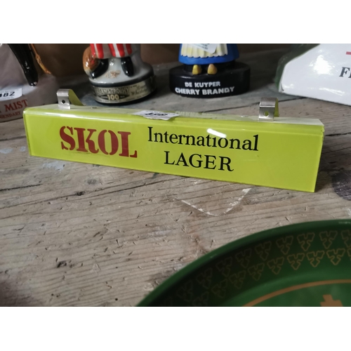 486 - Skol International Lager advertising shelf light.  { 7cm H X 30cm W }.