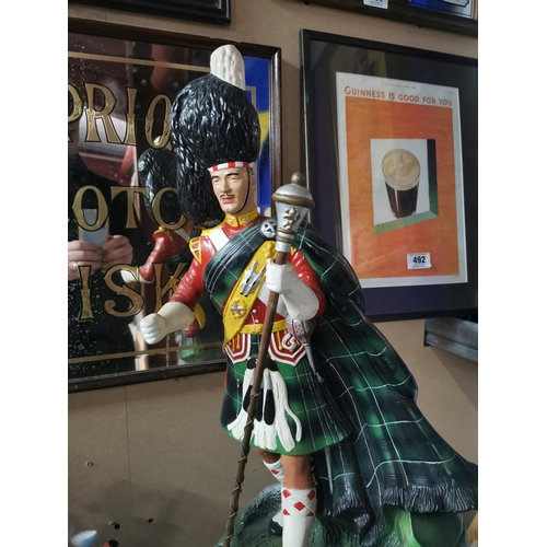 493 - Rare Dewar�s Whiskey rubberoid advertising Drum Major figure. {79 cm H x 38 cm W x 25 cm D}.