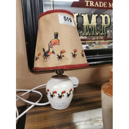 519 - Guinness ceramic lamp with original shade {27 cm H x 15 cm Dia.}.