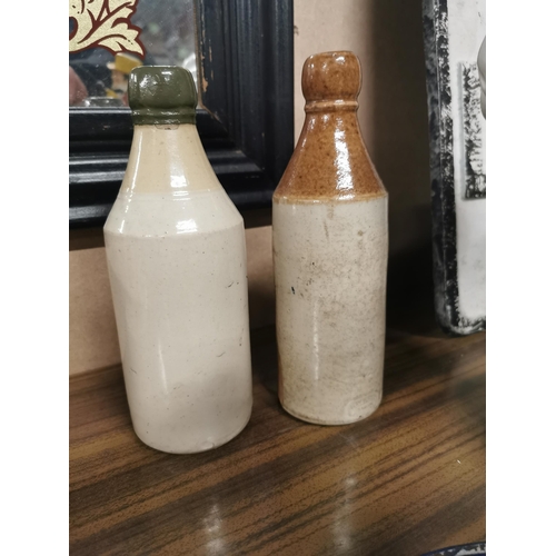 533 - Two Ginger Beer bottles � A Watt Londonderry and Ballymena. { 20 cm H x 7 cm Dia}.