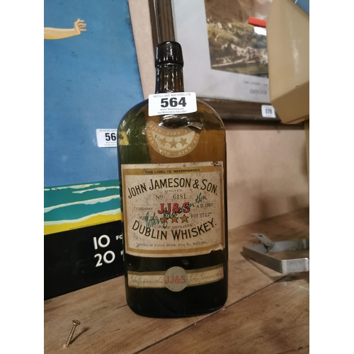 564 - Two empty John Jameson Whiskey bottles. {29 cm H x 11 cm W}