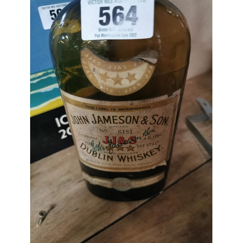 564 - Two empty John Jameson Whiskey bottles. {29 cm H x 11 cm W}