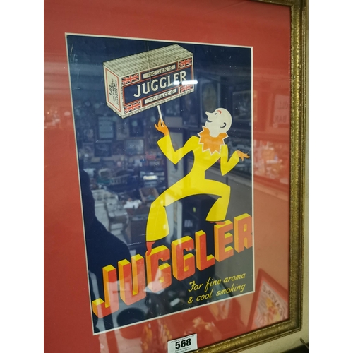 568 - Ogden's Juggler tobacco framed advertising show card {54 cm H x 42 cm W }