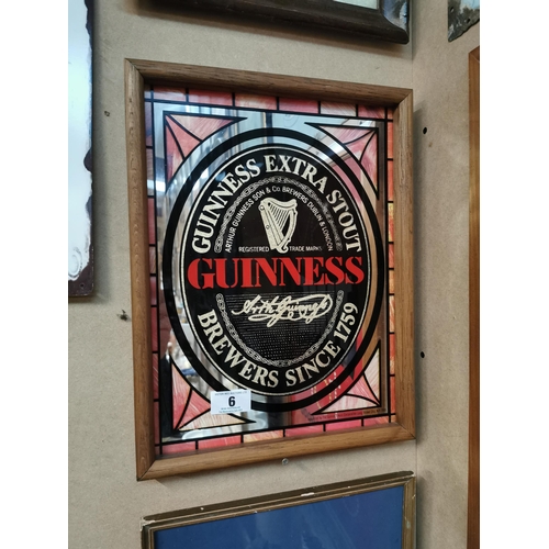 6 - Guinness Extra Stout framed advertising mirror. {45 cm H x 34 cm W}.