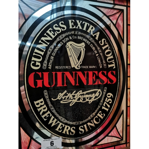 6 - Guinness Extra Stout framed advertising mirror. {45 cm H x 34 cm W}.