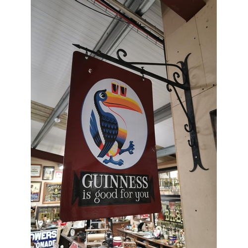 621 - Guinness Is Good For You double sided enamel sign with bracket. Sign  { 41 cm H x 61 cm Dia} with br... 