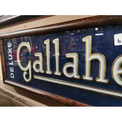 632 - Deluxe Gallaher�s Medium Flake framed reverse painted glass advertising sign. {27 cm H x 104 cm W}.