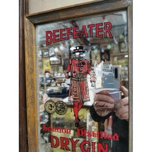 635 - Beefeater Dry Gin framed advertising mirror. { 34 cm H x 24 cm W}.