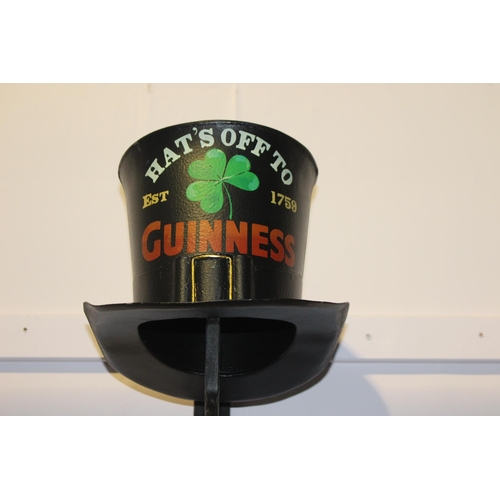 671 - Hat's Off To Guinness metal hat on bracket advertisement. {56 cm H x 23 cm W x 33 cm D}.