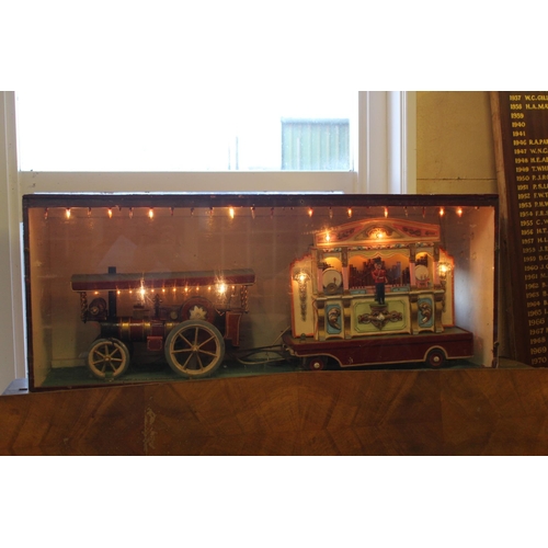 681 - Travelling Fairground Engine and Band with working lights in display case. {45 cm H x 112 cm W x 32 ... 