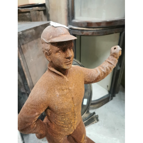 729 - Cast iron figure of Jockey. {76 cm H x 37 cm W x 24 cm D}.