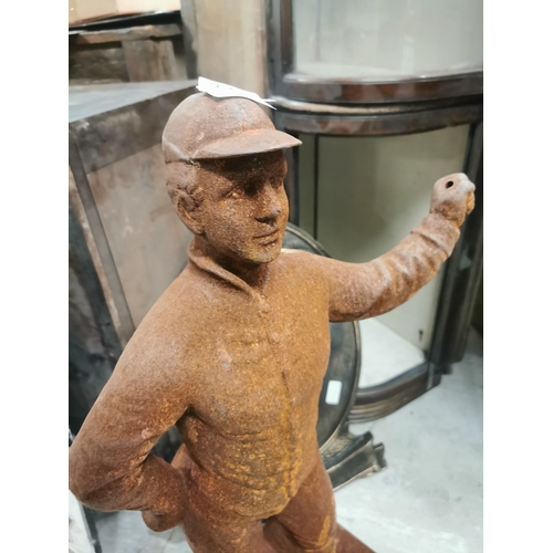 729 - Cast iron figure of Jockey. {76 cm H x 37 cm W x 24 cm D}.