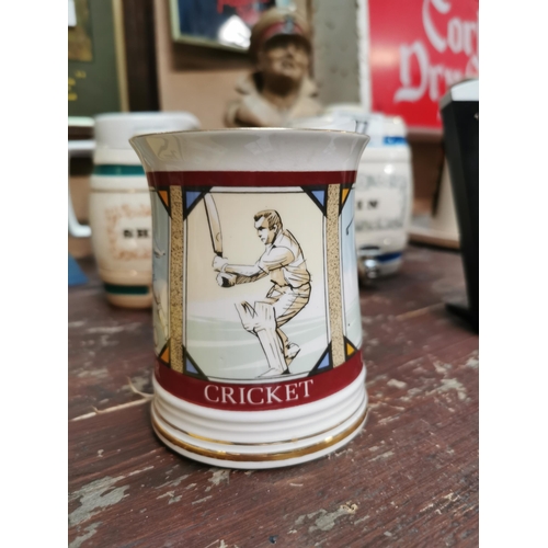 73 - Bone China Sportman� s Tankard Elizabethan edition depicting Cricket Soccer etc.  With slight damage... 