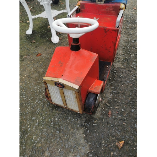 744 - Metal Fairground Model of Fireman and Engine. {102 cm H x 90 cm  W x 46 cm D}