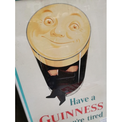 82 - Have a Guinness when you�re tired framed advertising print. {52 cm H x 36 cm W}.