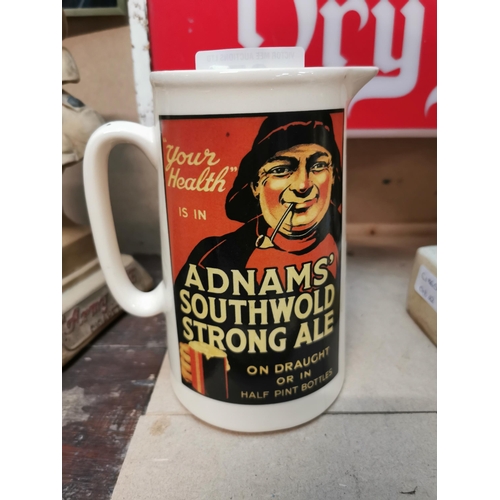 95 - Ceramic Adnam�s Southwold Strong Ale advertising Jug. {18 cm H x 15 cm W x 9 cm D}.