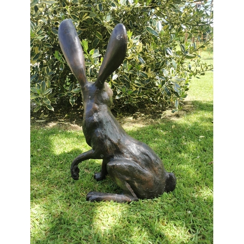 656A - Exceptional quality bronze model of a Hare {57 cm H x 39 cm W x 26 cm D}.