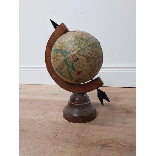 20 - 1980s world globe on mahogany stand {37 cm H x 22 cm Dia.}.