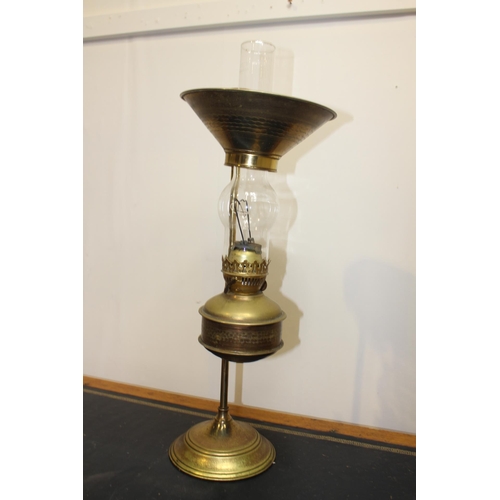 33 - Brass oil lamp {68 cm H x 24 cm Dia.}.