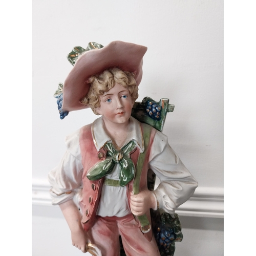 37 - Bisque figure of a Young Boy {28 cm H x 15 cm W}.