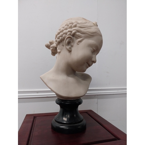 47 - Marble resin bust of a young girl {40 cm H x 22 cm W x 17 cm D}.