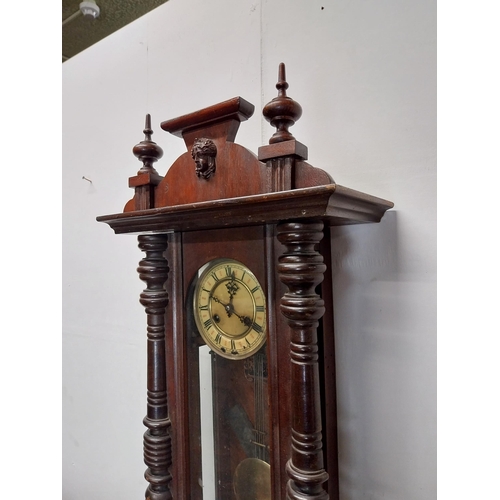 49 - Early 20th C. mahogany Vienna wall clock with enamel dial {82 cm H x 37 cm W x 18 cm D}.