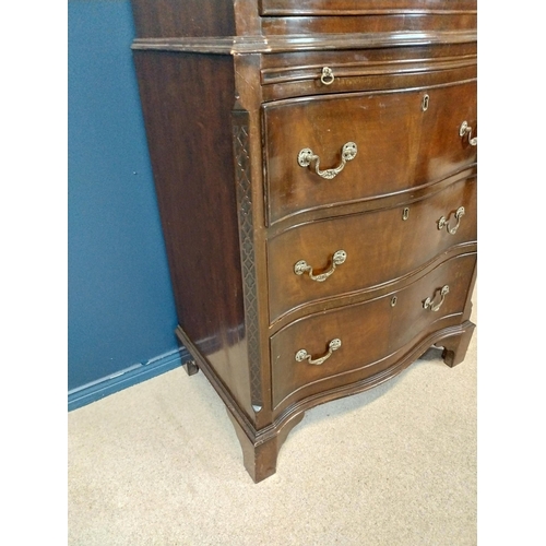 7 - Mahogany serpentine chest on chest with brushing slide raised on bracket feet in the Georgian style ... 