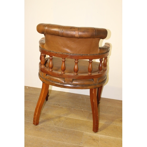 97 - Leather and mahogany Captain's chair {86 cm H x 64 cm W x 56 cm D}.