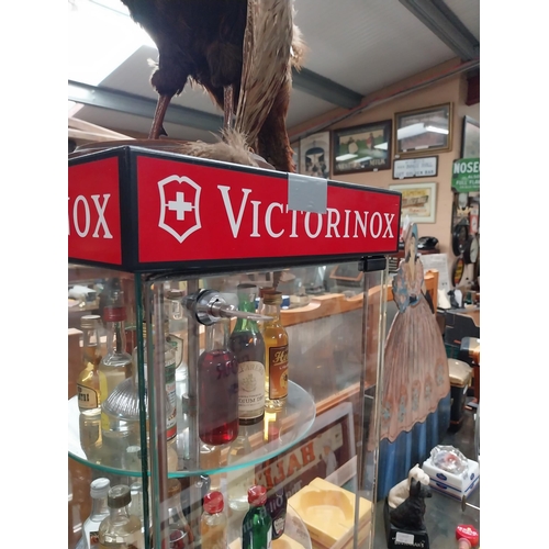 1000 - Victorinox glass display advertising cabinet with key {76 cm H x 31 cm W x 31 cm D}.