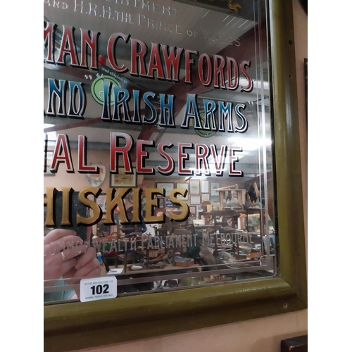 102 - H Sharman Crawford's Homeland Irish Arms framed advertising Mirror. {86 cm H x 43 cm W}.