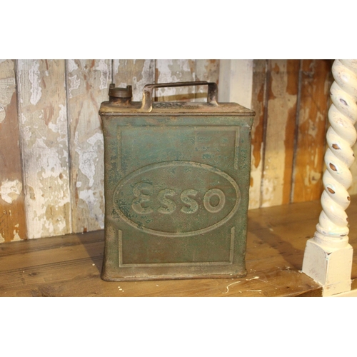 106 - Esso metal oil can. {33 cm H x 24 cm W x 15 cm D}.