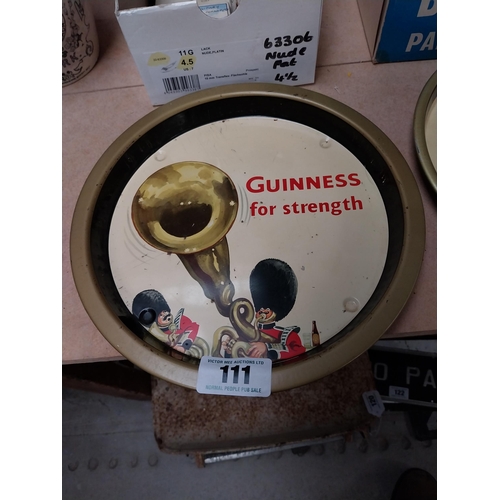 111 - Guinness For Strength advertising tray {27 cm Dia.}.