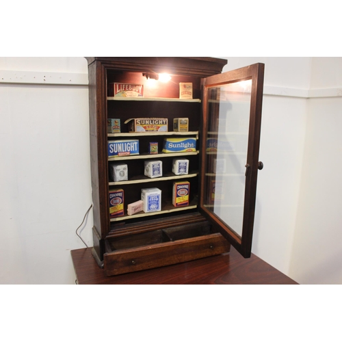 115 - Mahogany display cabinet with single drawer over glazed door. { 94 cm H x 65 cm W x 18 cm D}.