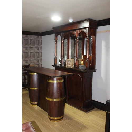 126 - Mahogany home bar and back bar with brass bound barrel front and mirrored back {230 cm H x 220 cm W ... 