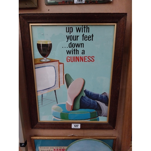 127 - Up with your feet�Down with a Guinness framed advertising print {58cm H x 46cm W}.